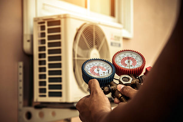 Professional Air Conditioning Service technician working in Livingston, MT
